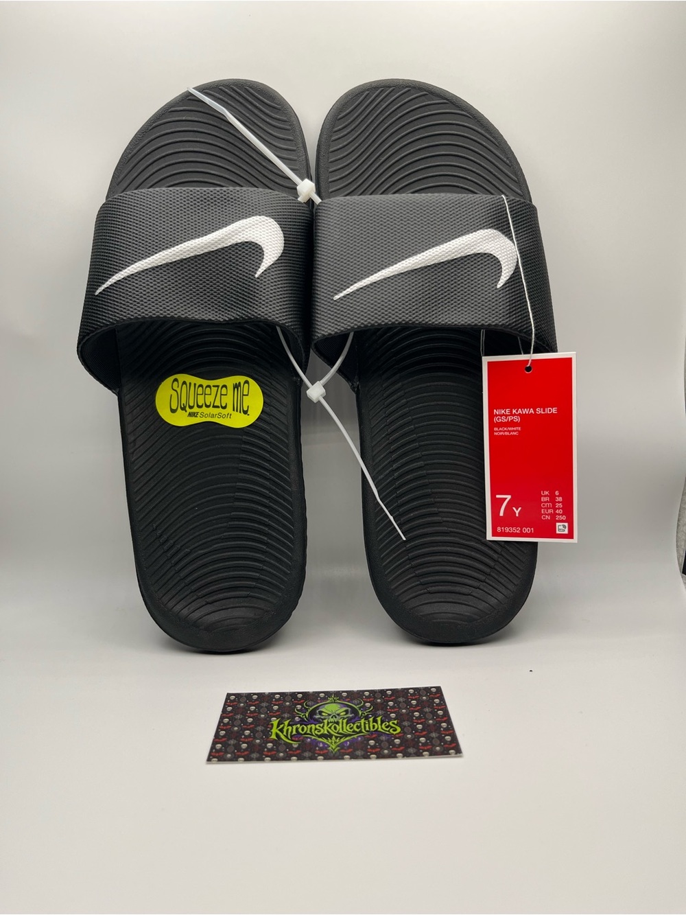 Nike Kids Black Slide Sandals with White Swoosh